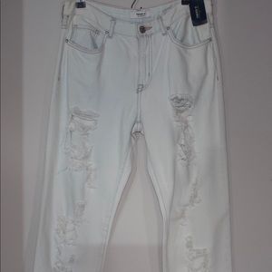 Ripped acid wash jeans